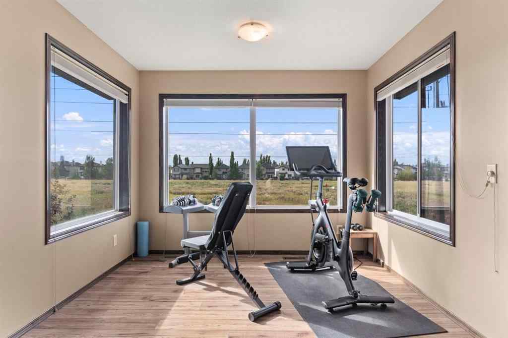 MLS® A2264040 - 498 Tuscany Ravine Road NW in Tuscany Calgary, Residential