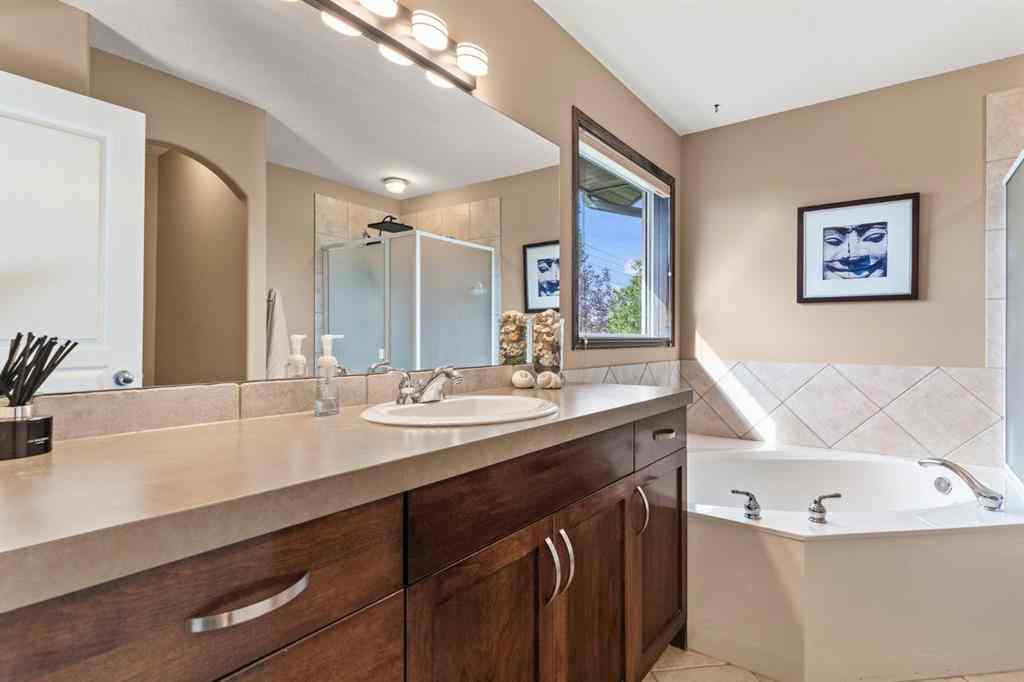 MLS® A2264040 - 498 Tuscany Ravine Road NW in Tuscany Calgary, Residential