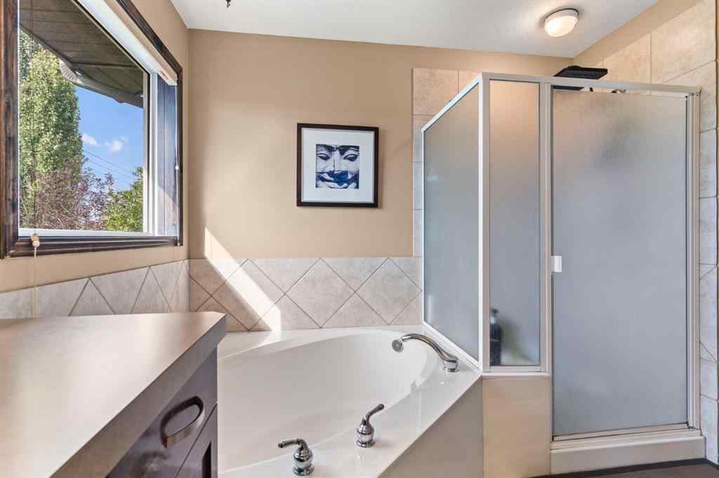 MLS® A2264040 - 498 Tuscany Ravine Road NW in Tuscany Calgary, Residential