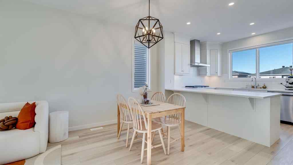 MLS® A2264041 - 18 Amblehurst Path NW in Moraine Calgary, Residential