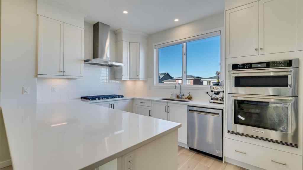 MLS® A2264041 - 18 Amblehurst Path NW in Moraine Calgary, Residential