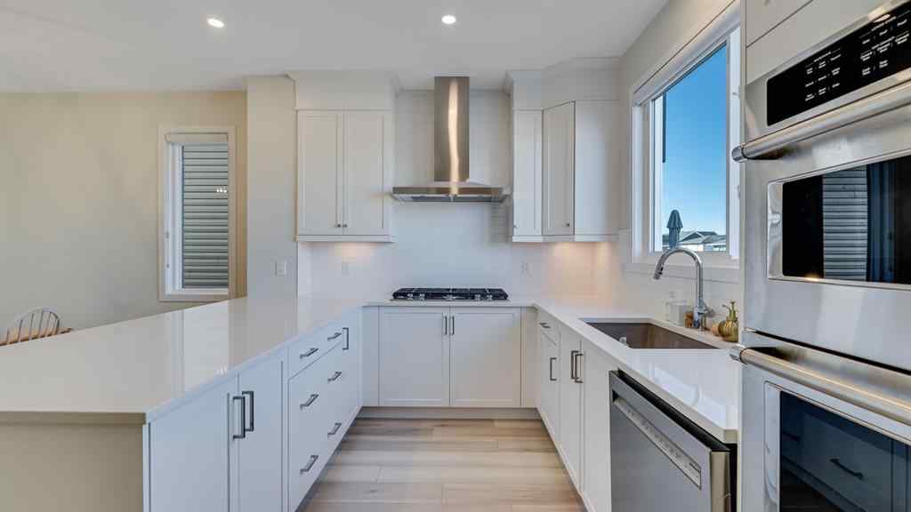 MLS® A2264041 - 18 Amblehurst Path NW in Moraine Calgary, Residential