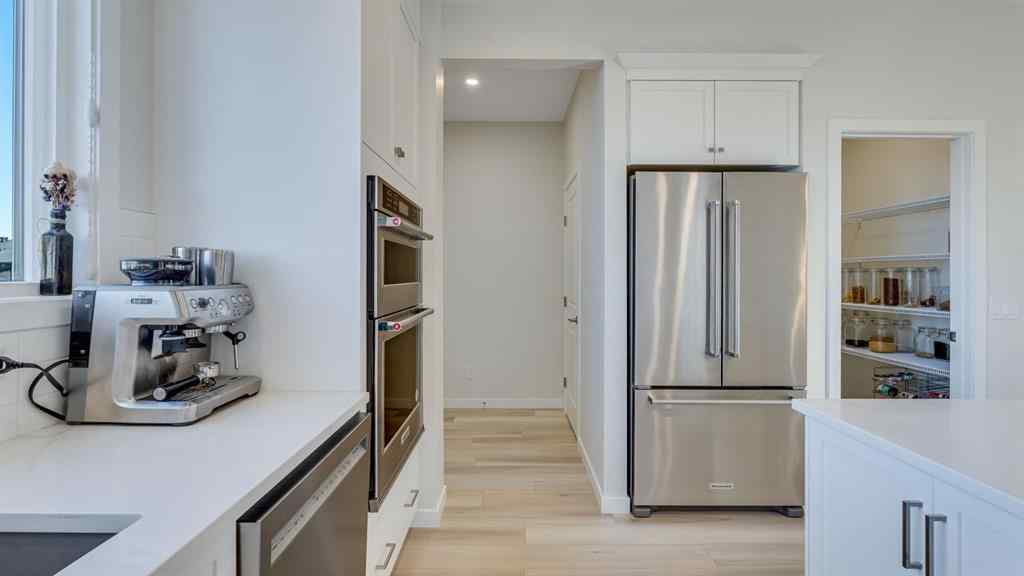 MLS® A2264041 - 18 Amblehurst Path NW in Moraine Calgary, Residential