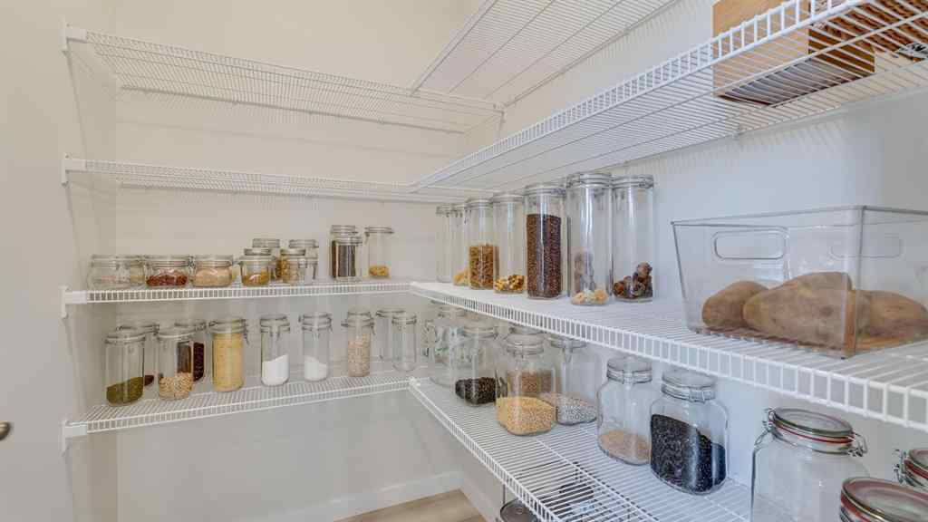 MLS® A2264041 - 18 Amblehurst Path NW in Moraine Calgary, Residential