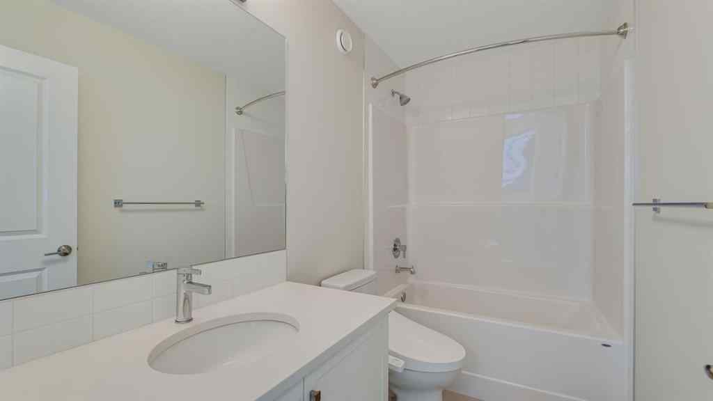 MLS® A2264041 - 18 Amblehurst Path NW in Moraine Calgary, Residential