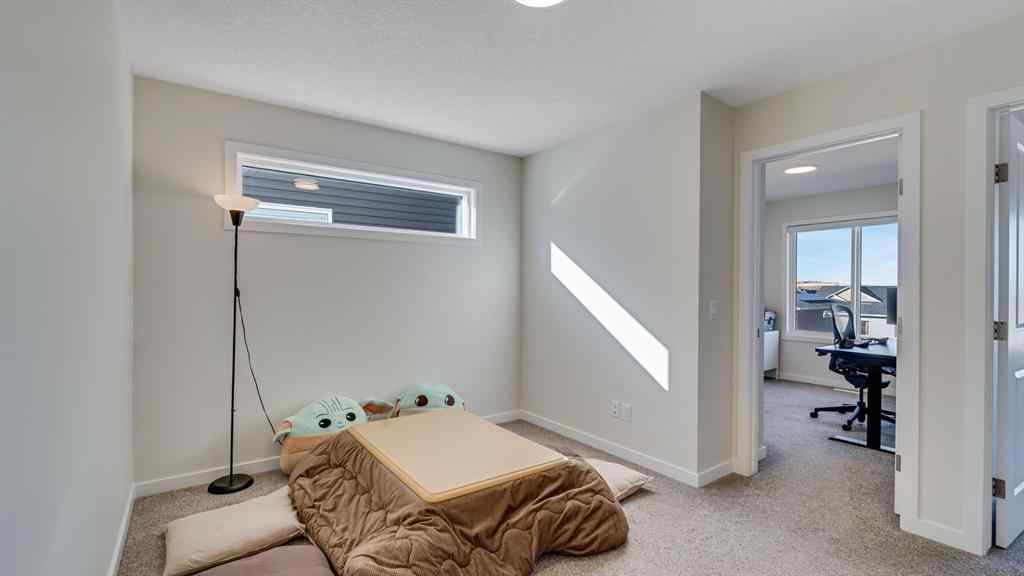 MLS® A2264041 - 18 Amblehurst Path NW in Moraine Calgary, Residential