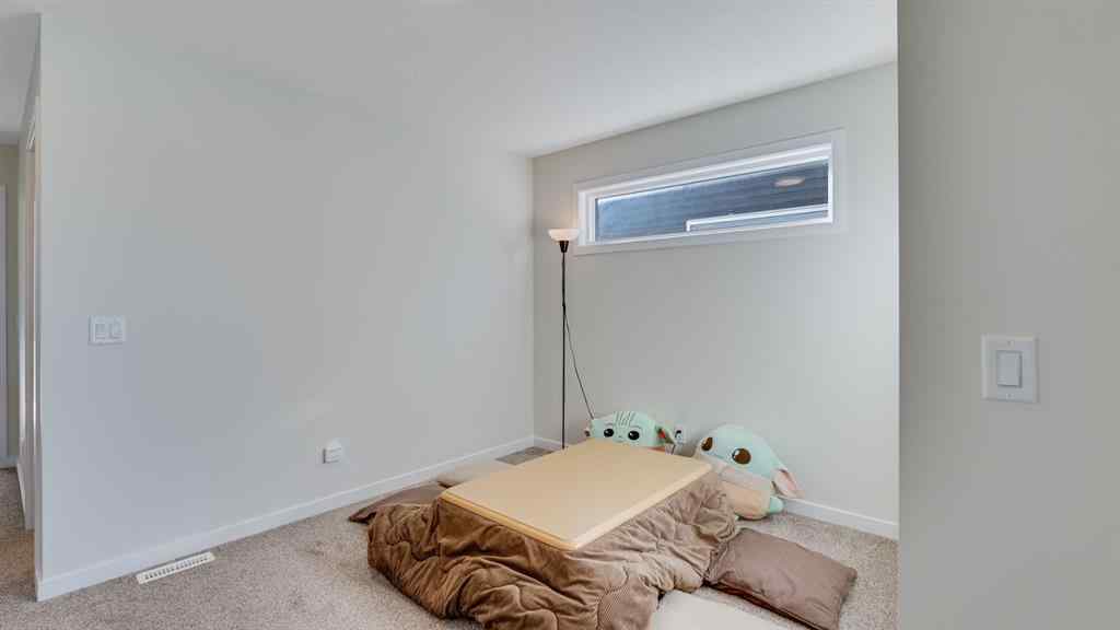 MLS® A2264041 - 18 Amblehurst Path NW in Moraine Calgary, Residential