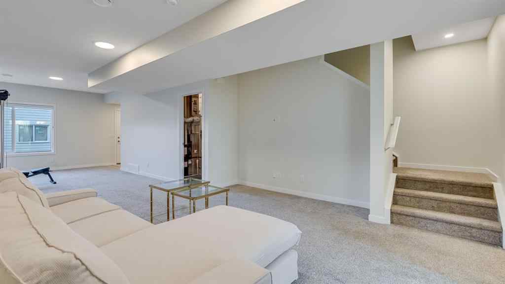 MLS® A2264041 - 18 Amblehurst Path NW in Moraine Calgary, Residential