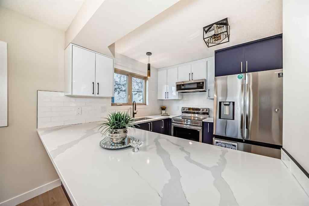 MLS® A2264049 - 311 Shawnessy Drive SW in Shawnessy Calgary, Residential