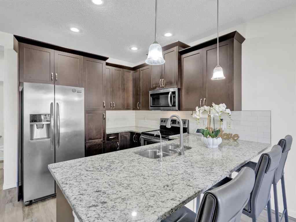 MLS® A2264052 - 551 EVANSBOROUGH Way NW in Evanston Calgary, Residential