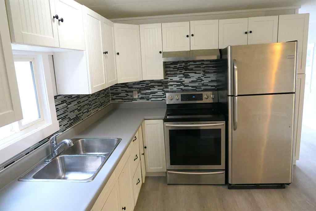 MLS® A2264055 - 205 14 Street NW in Midland Drumheller, Residential