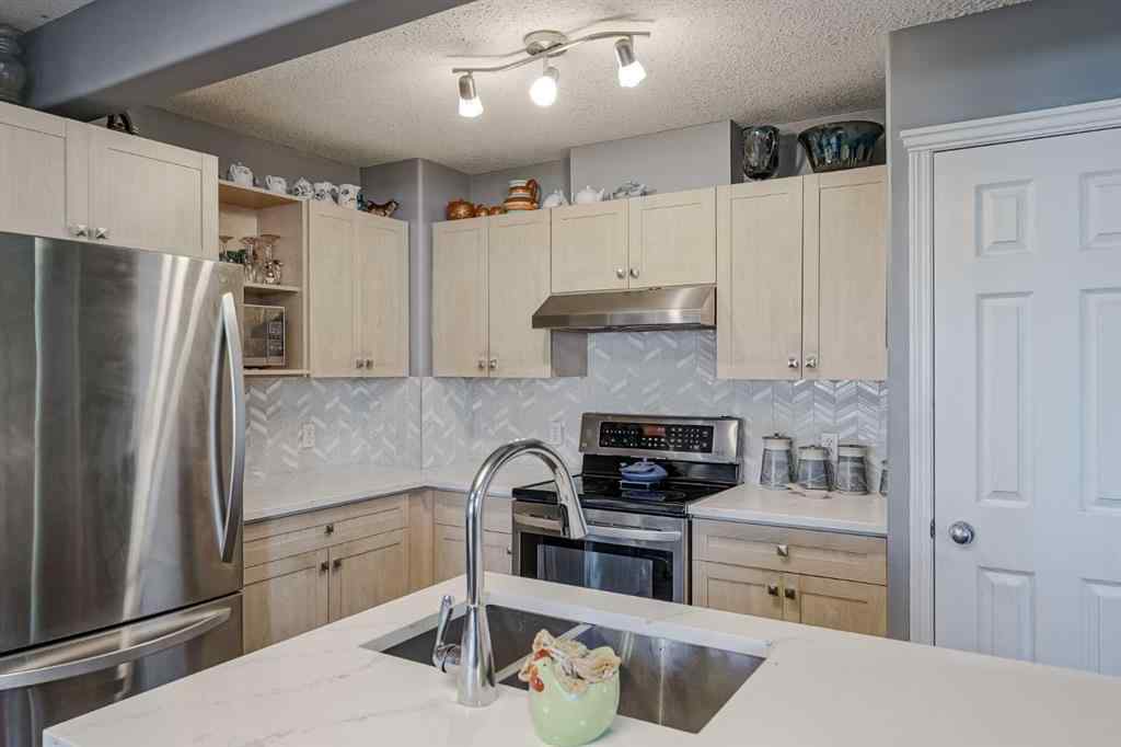 MLS® A2264070 - Unit #7 102 Canoe Square SW in Canals Airdrie, Residential