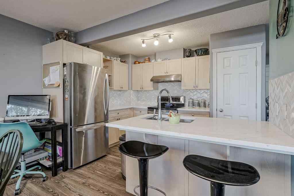 MLS® A2264070 - Unit #7 102 Canoe Square SW in Canals Airdrie, Residential
