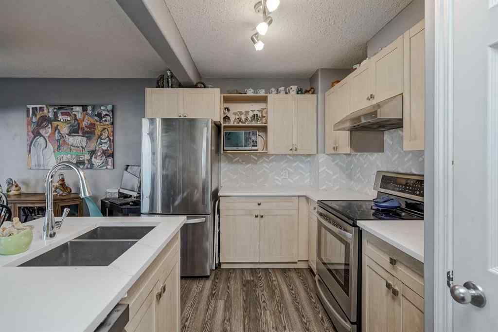MLS® A2264070 - Unit #7 102 Canoe Square SW in Canals Airdrie, Residential