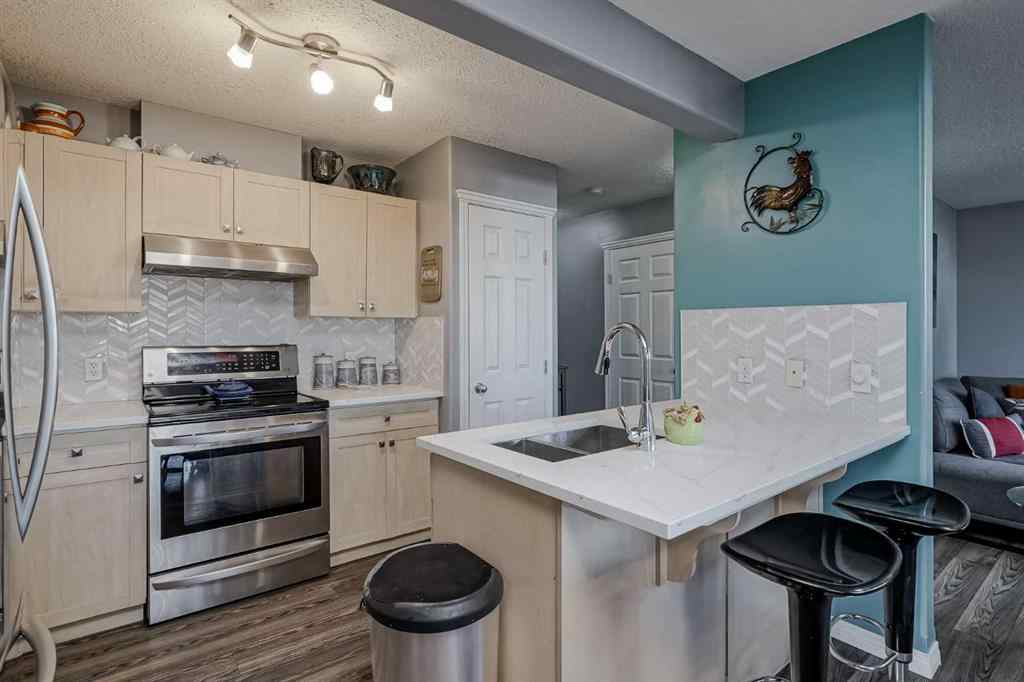 MLS® A2264070 - Unit #7 102 Canoe Square SW in Canals Airdrie, Residential