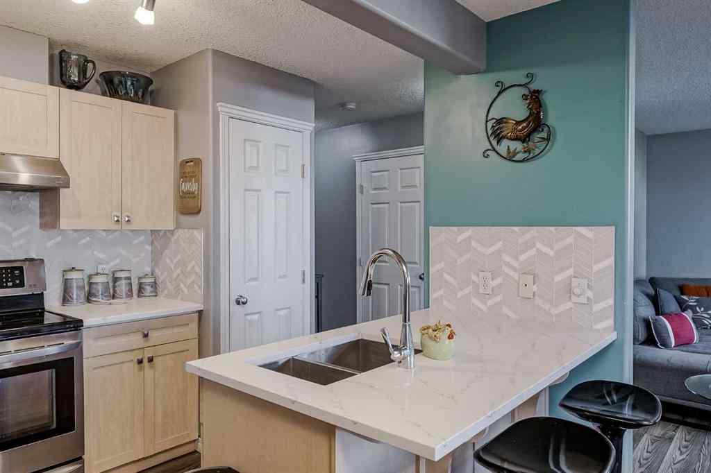 MLS® A2264070 - Unit #7 102 Canoe Square SW in Canals Airdrie, Residential