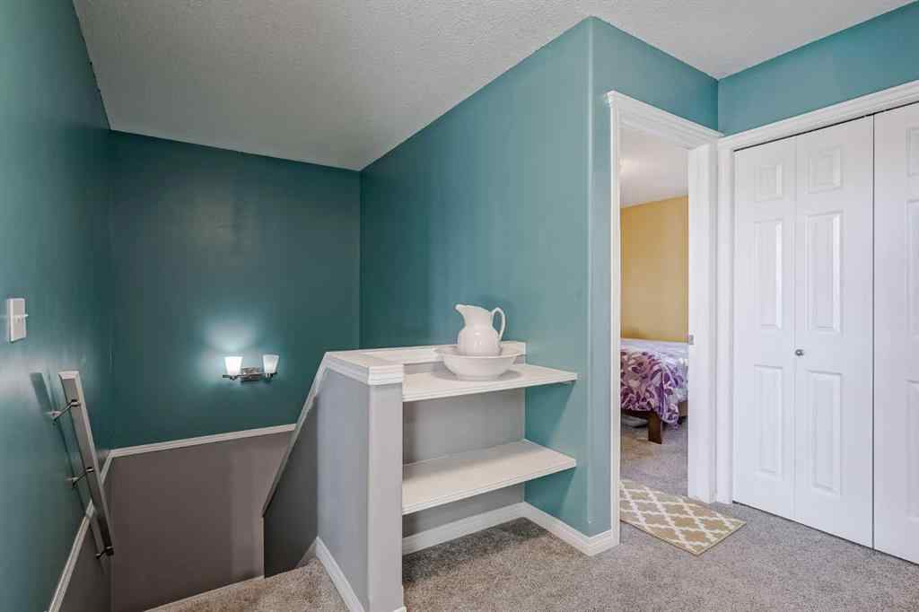 MLS® A2264070 - Unit #7 102 Canoe Square SW in Canals Airdrie, Residential