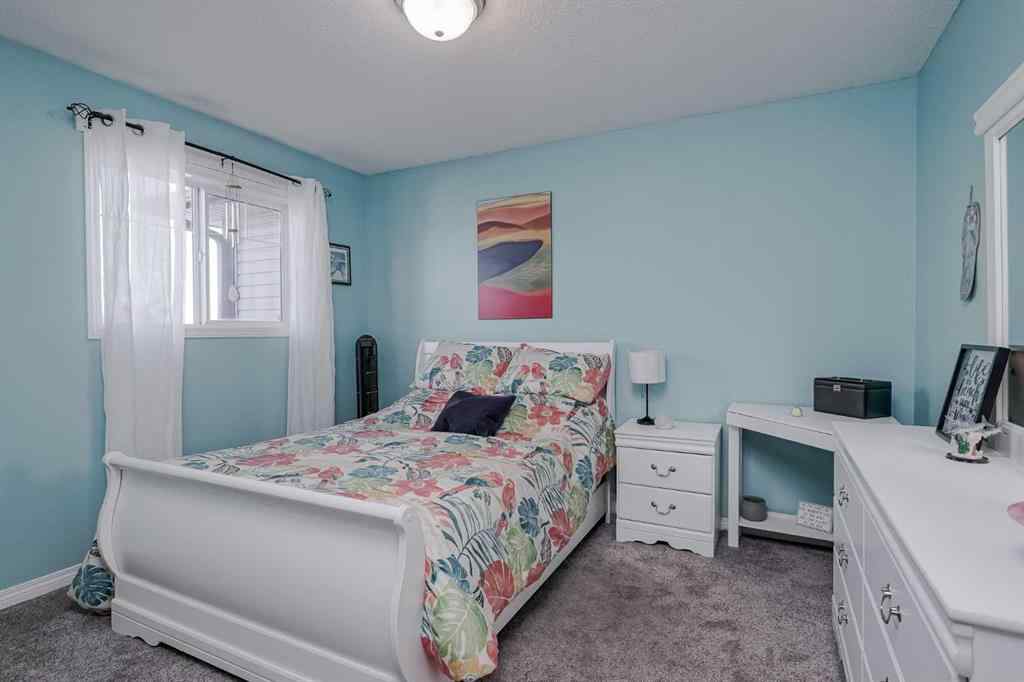 MLS® A2264070 - Unit #7 102 Canoe Square SW in Canals Airdrie, Residential