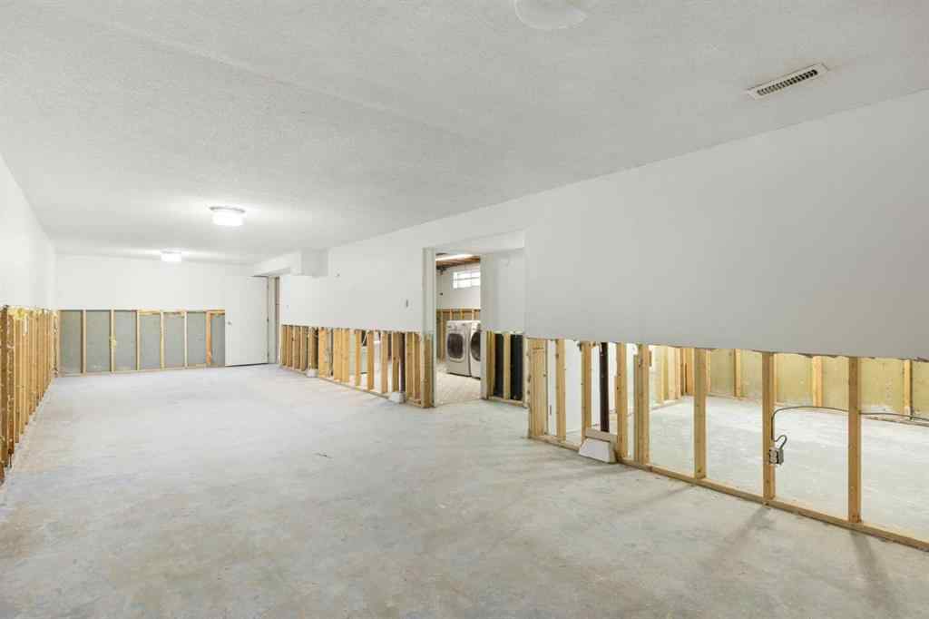 MLS® A2264077 - 58 Kingsland Place SW in Kingsland Calgary, Residential