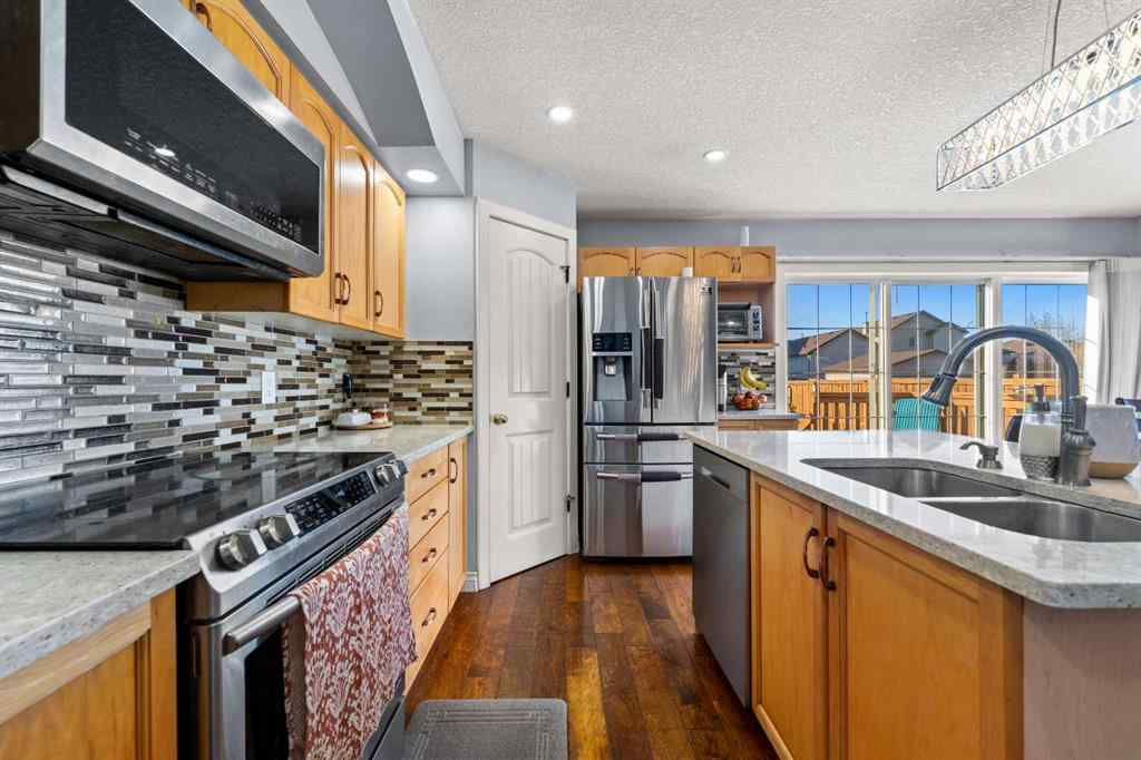 MLS® A2264088 - 9287 Saddlebrook Drive NE in Saddle Ridge Calgary, Residential