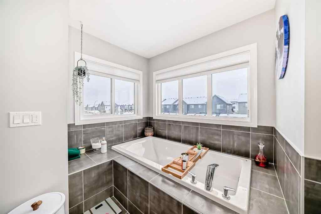 MLS® A2264093 - 564 Belmont Heath SW in Belmont Calgary, Residential