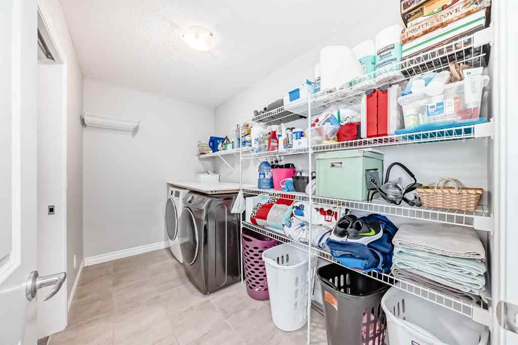 MLS® A2264093 - 564 Belmont Heath SW in Belmont Calgary, Residential