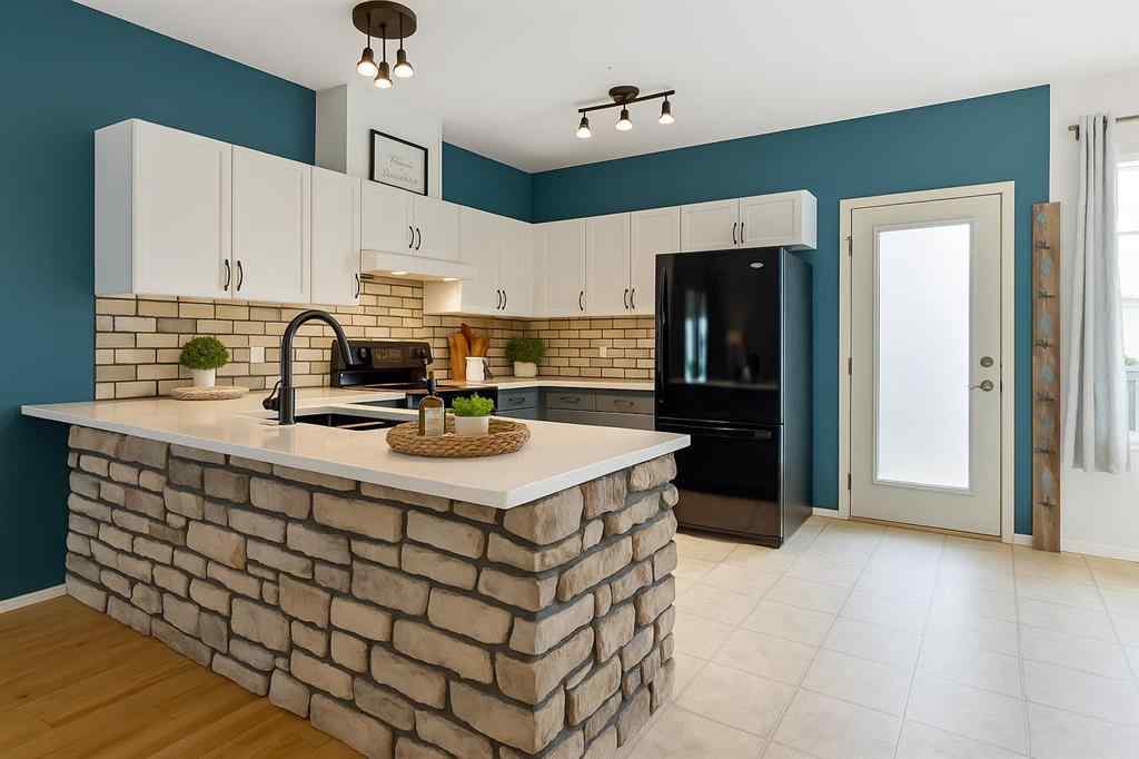 MLS® A2264104 - Unit #106 2006 Luxstone Boulevard  in Luxstone Airdrie, Residential