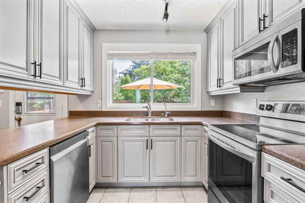 MLS® A2264112 - 16 Deer Ridge Court SE in Deer Ridge Calgary, Residential