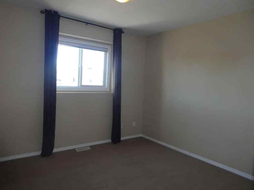 MLS® A2264117 - 310 Sunrise Terrace NE in Sunshine Meadow High River, Residential