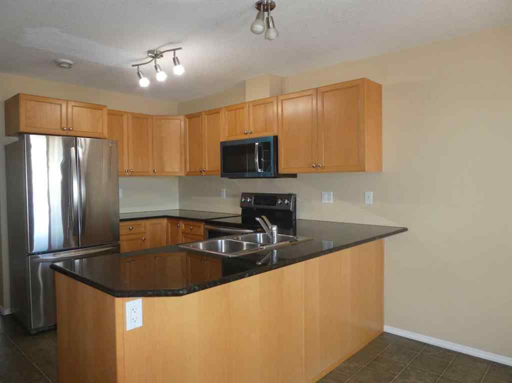 MLS® A2264117 - 310 Sunrise Terrace NE in Sunshine Meadow High River, Residential