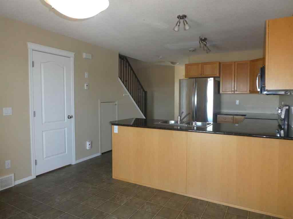 MLS® A2264117 - 310 Sunrise Terrace NE in Sunshine Meadow High River, Residential