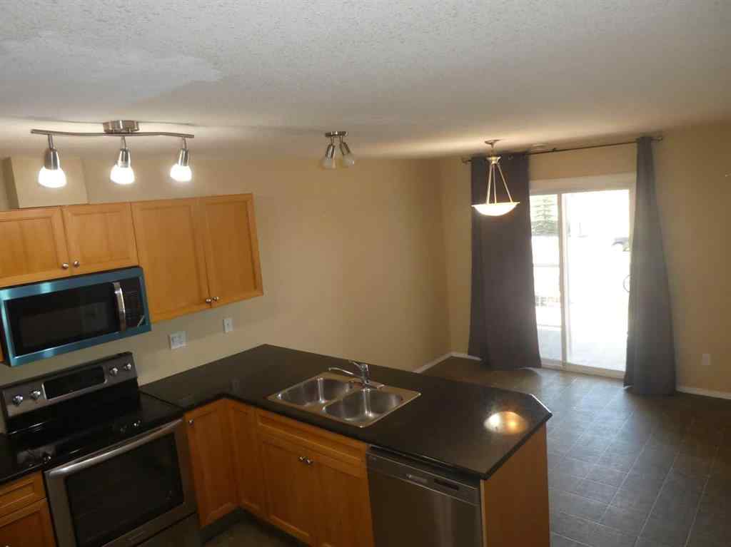 MLS® A2264117 - 310 Sunrise Terrace NE in Sunshine Meadow High River, Residential