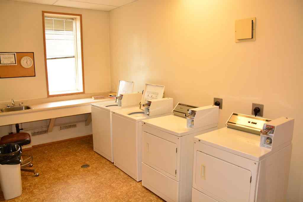 MLS® A2264118 - Unit #101-215 10118 100 Avenue  in Downtown Peace River, Multi-Family