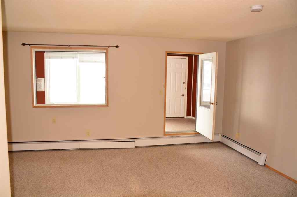 MLS® A2264118 - Unit #101-215 10118 100 Avenue  in Downtown Peace River, Multi-Family