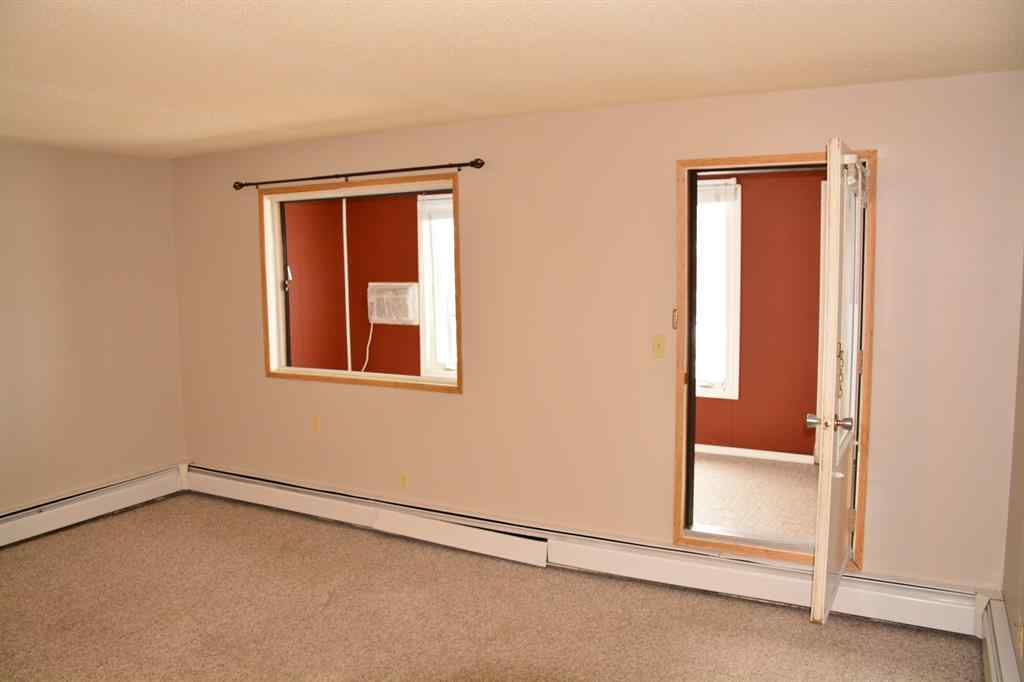 MLS® A2264118 - Unit #101-215 10118 100 Avenue  in Downtown Peace River, Multi-Family