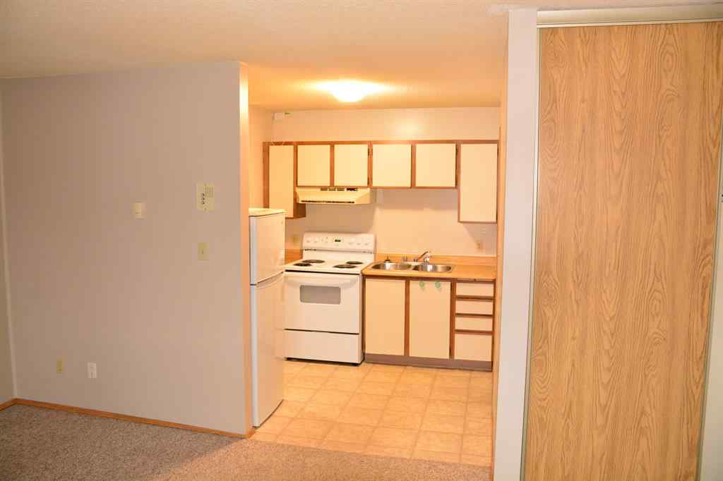 MLS® A2264118 - Unit #101-215 10118 100 Avenue  in Downtown Peace River, Multi-Family