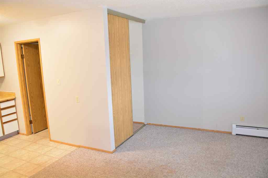 MLS® A2264118 - Unit #101-215 10118 100 Avenue  in Downtown Peace River, Multi-Family