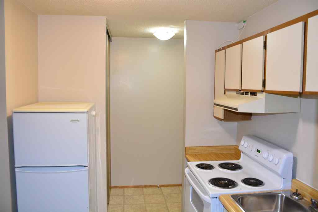 MLS® A2264118 - Unit #101-215 10118 100 Avenue  in Downtown Peace River, Multi-Family