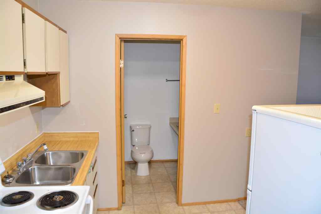 MLS® A2264118 - Unit #101-215 10118 100 Avenue  in Downtown Peace River, Multi-Family