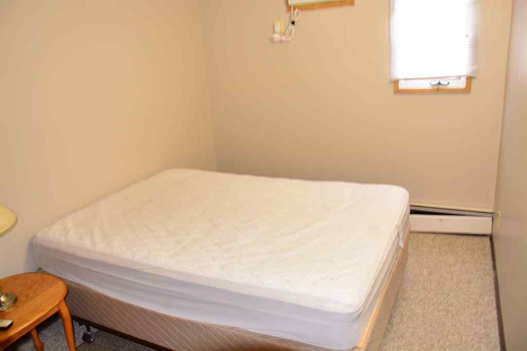 MLS® A2264118 - Unit #101-215 10118 100 Avenue  in Downtown Peace River, Multi-Family