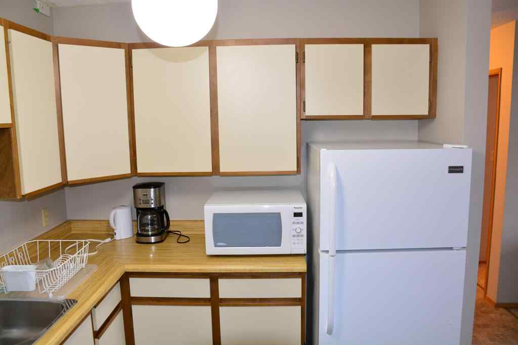 MLS® A2264118 - Unit #101-215 10118 100 Avenue  in Downtown Peace River, Multi-Family