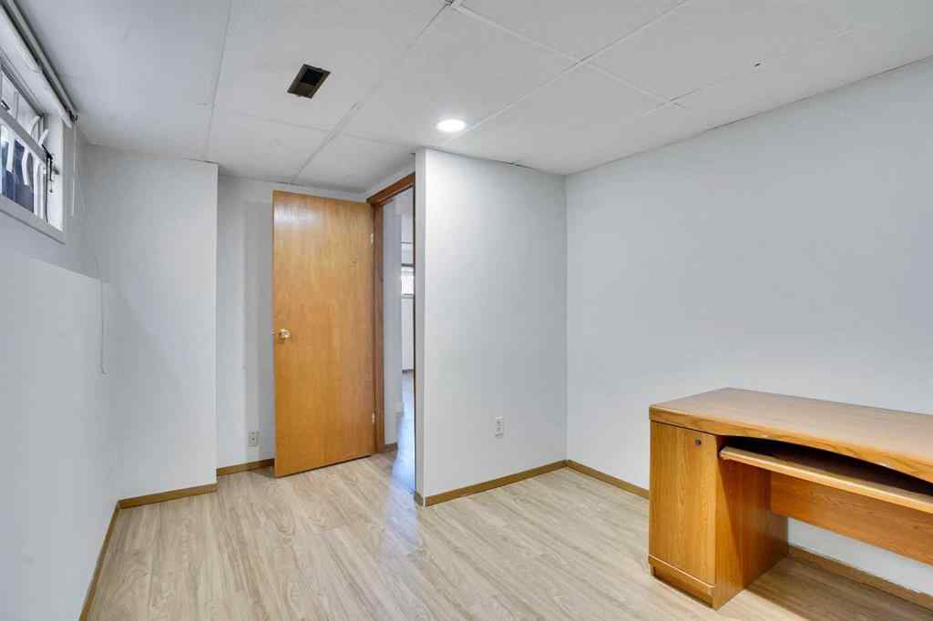 MLS® A2264119 - 52 Erin Park Drive SE in Erin Woods Calgary, Residential