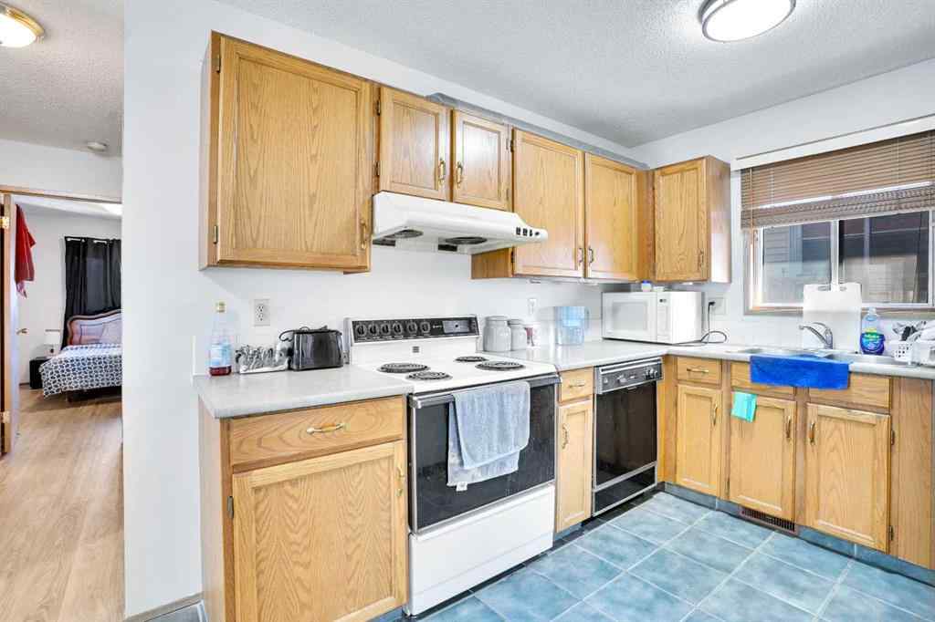 MLS® A2264119 - 52 Erin Park Drive SE in Erin Woods Calgary, Residential