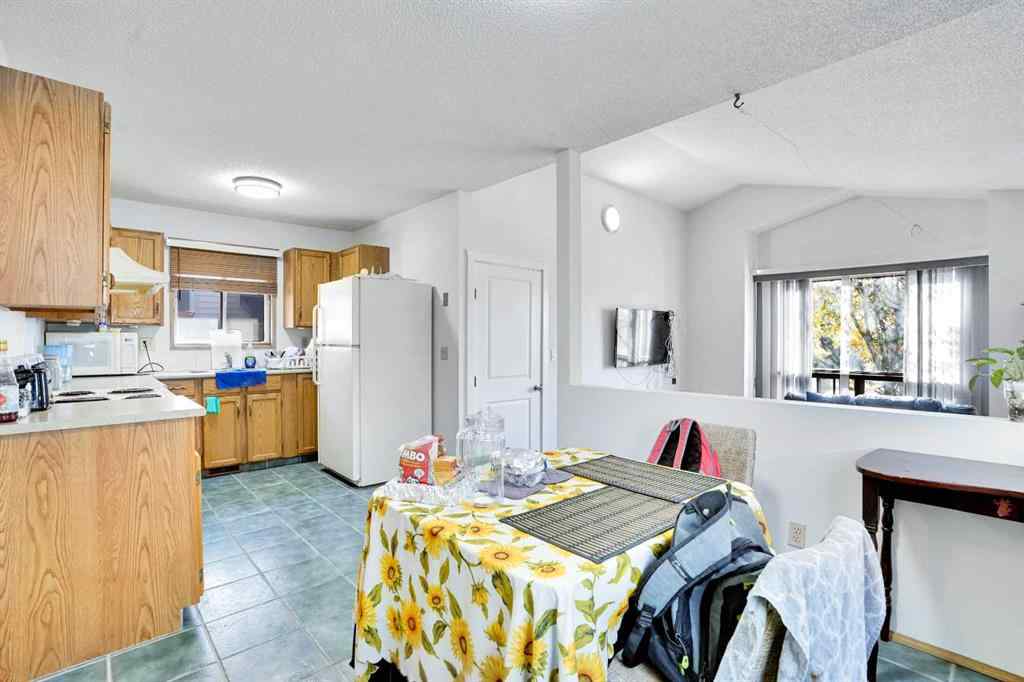 MLS® A2264119 - 52 Erin Park Drive SE in Erin Woods Calgary, Residential