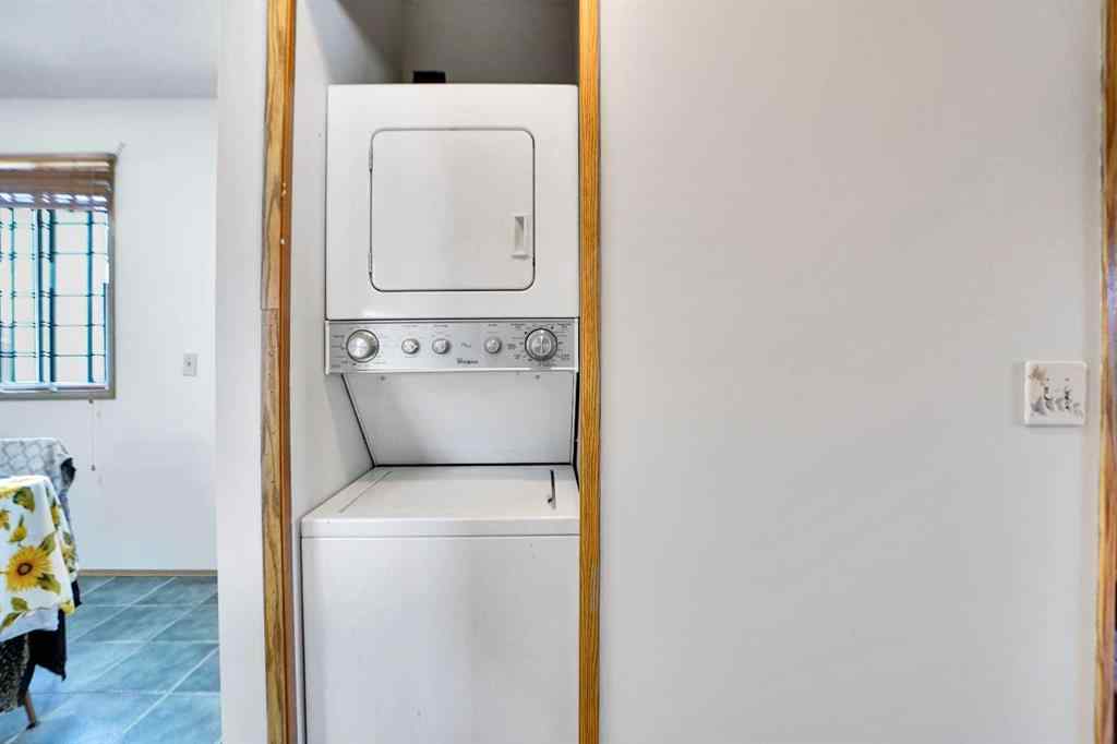 MLS® A2264119 - 52 Erin Park Drive SE in Erin Woods Calgary, Residential