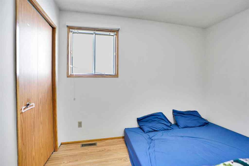 MLS® A2264119 - 52 Erin Park Drive SE in Erin Woods Calgary, Residential