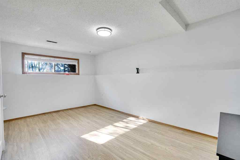 MLS® A2264119 - 52 Erin Park Drive SE in Erin Woods Calgary, Residential