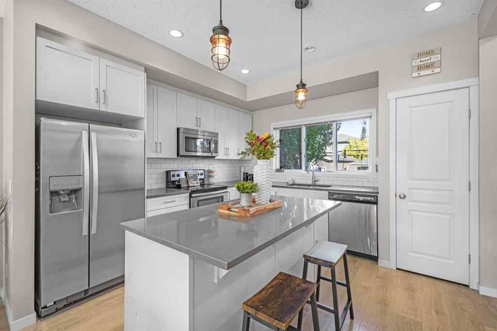 MLS® A2264141 - 8048 Masters Boulevard SE in Mahogany Calgary, Residential