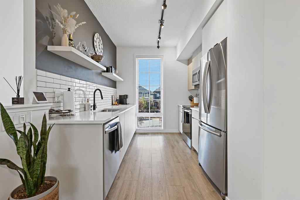 MLS® A2264157 - 918 Walgrove Boulevard SE in Walden Calgary, Residential