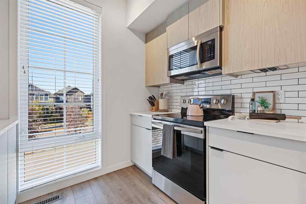 MLS® A2264157 - 918 Walgrove Boulevard SE in Walden Calgary, Residential